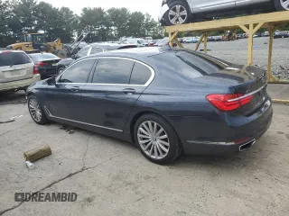 2017 BMW 7 Series 740i xDrive with VIN WBA7E4C32HGU99963, listed as a Copart auction lot 65848354 with 99,396 mi miles and Salvage Title. Bid and sale history available at carsss.com. Image 2.