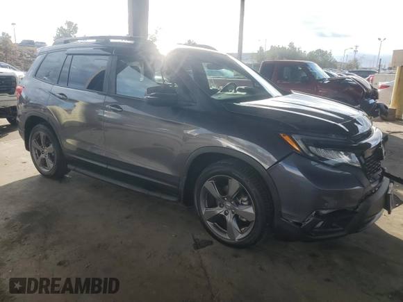 2021 Honda Passport Touring с VIN 5FNYF7H97MB012926, выставлен на аукционе Copart как лот 79346014 с пробегом 59 096 миль миль и Списание • Salvage title. История ставок и продаж доступна на DreamBid. Изображение 4.
