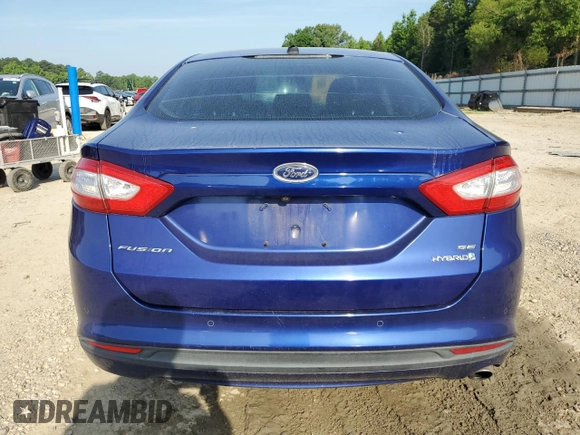 2013 Ford Fusion SE Hybrid z VIN 3FA6P0LU8DR295297, wystawiony jako Copart lot #61830065 z przebiegiem 190 096 mil mil oraz Czysty tytuł • Clean title. Historia ofert i sprzedaży dostępna na DreamBid. Obrazek 6.