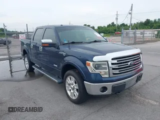 2013 Ford F-150 XL with VIN 1FTFW1ETXDKF51063, listed as a IAAI auction lot 42790441 with 303,665 mi miles and . Bid and sale history available at DreamBid. Image 1.
