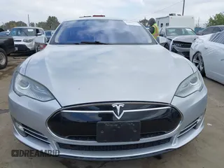 2013 Tesla Model S with VIN 5YJSA1DG7DFP11382, listed as a IAAI auction lot 42056169 with 126,975 mi miles. Bid and sale history available at carsss.com. Image 12.