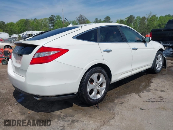 2010 Honda Crosstour EX-L z VIN 5J6TF2H55AL011092, wystawiony jako IAAI lot #42113820 z przebiegiem 239 179 mil mil oraz . Historia ofert i sprzedaży dostępna na DreamBid. Obrazek 4.