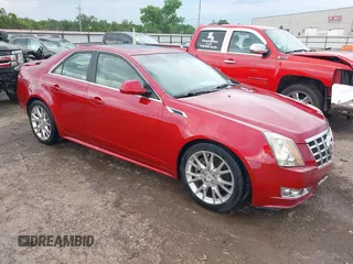 2013 Cadillac CTS Performance z VIN 1G6DK5E3XD0117945, wystawiony jako IAAI lot #42341416 z przebiegiem 67 428 mil mil oraz . Historia ofert i sprzedaży dostępna na DreamBid. Obrazek 1.