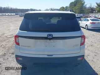 2019 Honda Passport Elite z VIN 5FNYF8H04KB005307, wystawiony jako IAAI lot #41828725 z przebiegiem 61 864 mil mil oraz . Historia ofert i sprzedaży dostępna na DreamBid. Obrazek 16.