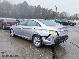 2013 Hyundai Sonata Hybrid with VIN KMHEC4A44DA077276, listed as a IAAI auction lot 41752360 with 62,700 mi miles. Bid and sale history available at carsss.com. Image 3.