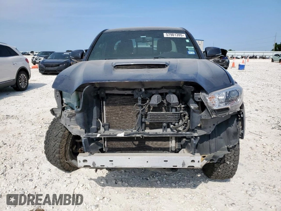 2017 Toyota Tacoma SR5 z VIN 5TFRZ5CNXHX025315, wystawiony jako Copart lot #57901395 z przebiegiem 158 197 mil mil oraz Szkoda całkowita • Salvage title. Historia ofert i sprzedaży dostępna na DreamBid. Obrazek 5.