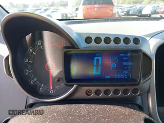 2016 Chevrolet Sonic LTZ z VIN 1G1JE5SB5G4160324, wystawiony jako IAAI lot #42162934 z przebiegiem 56 551 mil mil oraz . Historia ofert i sprzedaży dostępna na DreamBid. Obrazek 7.