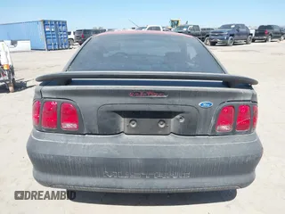 1997 Ford Mustang with VIN 1FALP4044VF195081, listed as a IAAI auction lot 41725150 with 124,009 mi miles. Bid and sale history available at carsss.com. Image 16.