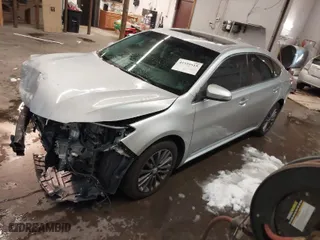 2013 Toyota Avalon Hybrid XLE Premium with VIN 4T1BD1EB5DU005850, listed as a IAAI auction lot 41559515 with 152,206 mi miles. Bid and sale history available at carsss.com. Image 2.