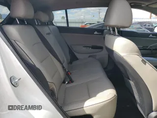 2020 Kia Sportage EX z VIN KNDPNCAC0L7805972, wystawiony jako Copart lot #52038825 z przebiegiem 65 794 mil mil oraz Szkoda całkowita • Salvage title. Historia ofert i sprzedaży dostępna na DreamBid. Obrazek 11.
