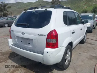 2006 Hyundai Tucson GL with VIN KM8JM12B66U254774, listed as a IAAI auction lot 41940080 with 152,382 mi miles. Bid and sale history available at carsss.com. Image 4.