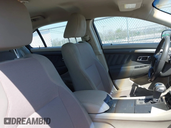 2011 Ford Taurus SEL with VIN 1FAHP2EW5BG189882, listed as a IAAI auction lot 42006542 with 208,661 mi miles. Bid and sale history available at carsss.com. Image 5.