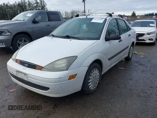 2003 Ford Focus LX with VIN 1FAFP33P73W156382, listed as a IAAI auction lot 41591885 with 174,169 mi miles and . Bid and sale history available at carsss.com. Image 2.
