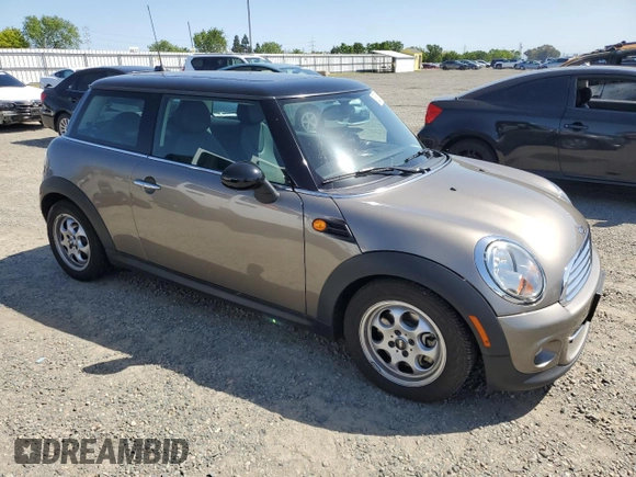 2013 MINI Hardtop with VIN WMWSU3C57DT678736, listed as a Copart auction lot 52586285 with 64,563 mi miles and Salvage Title. Bid and sale history available at DreamBid. Image 4.
