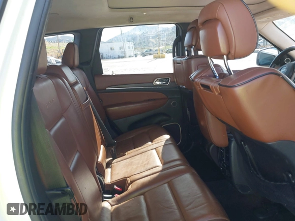 2016 Jeep Grand Cherokee with VIN 1C4RJEJM8GC321506, listed as a IAAI auction lot 41969587 with 226,072 mi miles and . Bid and sale history available at DreamBid. Image 8.