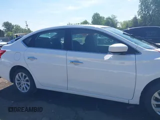 2019 Nissan Sentra S z VIN 3N1AB7AP6KY413233, wystawiony jako IAAI lot #42281572 z przebiegiem 111 297 mil mil oraz . Historia ofert i sprzedaży dostępna na DreamBid. Obrazek 14.