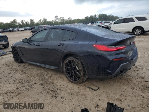 2022 BMW 8 Series M850i z VIN WBAGV8C02NCH18326, wystawiony jako Copart lot #78362624 z przebiegiem 21 393 mil mil oraz Szkody całkowita. Historia ofert i sprzedaży dostępna na DreamBid. Obrazek 2.