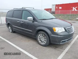 2015 Chrysler Town & Country Touring-L with VIN 2C4RC1CG9FR674238, listed as a IAAI auction lot 41908335 with 138,819 mi miles. Bid and sale history available at carsss.com. Image 1.
