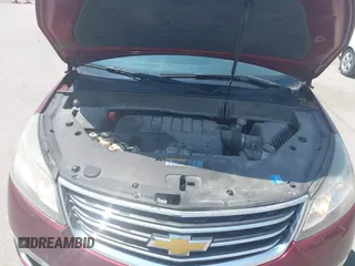 2015 Chevrolet Traverse LT z VIN 1GNKVHKD2FJ241884, wystawiony jako IAAI lot #42452598 z przebiegiem 194 214 mil mil oraz . Historia ofert i sprzedaży dostępna na DreamBid. Obrazek 10.