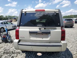 2007 Jeep Commander Sport z VIN 1J8HG48K67C651209, wystawiony jako Copart lot #64049035 z przebiegiem 216 628 mil mil oraz Szkoda całkowita • Salvage title. Historia ofert i sprzedaży dostępna na DreamBid. Obrazek 6.