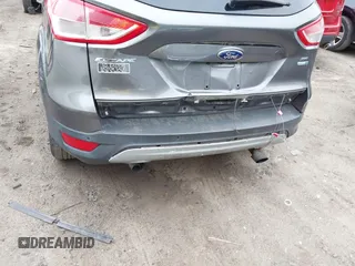 2014 Ford Escape SE with VIN 1FMCU9GX8EUA65568, listed as a IAAI auction lot 42435114 with 128,278 mi miles and . Bid and sale history available at DreamBid. Image 6.
