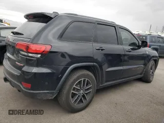 2017 Jeep Grand Cherokee Trailhawk with VIN 1C4RJFLT5HC692439, listed as a Copart auction lot 81093534 with 135,493 mi miles and Salvage title. Bid and sale history available at DreamBid. Image 3.
