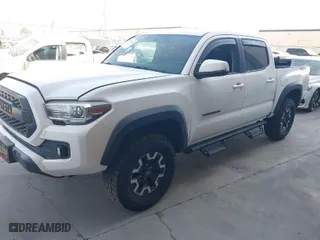 2017 Toyota Tacoma SR5 with VIN 3TMAZ5CN2HM045318, listed as a IAAI auction lot 41824555 with 80,918 mi miles. Bid and sale history available at carsss.com. Image 2.