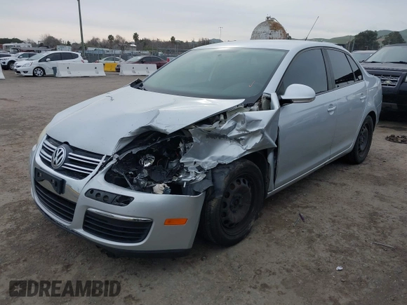 2010 Volkswagen Jetta Sedan S with VIN 3VWJZ7AJ1AM003298, listed as a IAAI auction lot 41583771 with 127,234 mi miles. Bid and sale history available at carsss.com. Image 2.