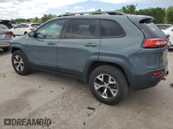 2015 Jeep Cherokee Trailhawk с VIN 1C4PJMBSXFW555223, выставлен на аукционе Copart как лот 62072235 с пробегом 207 240 миль миль и На запчасти • Non repairable. История ставок и продаж доступна на DreamBid. Изображение 2.