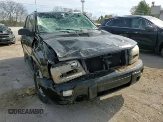 2003 Chevrolet TrailBlazer LTZ with VIN 1GNDT13S332196883, listed as a Copart auction lot 77031124 with 167,328 mi miles and Salvage Title. Bid and sale history available at DreamBid. Image 12.