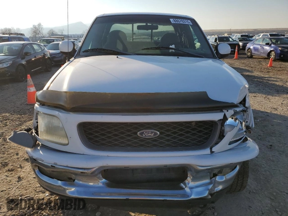1998 Ford F-150 z VIN 1FTZX18W3WKB01774, wystawiony jako Copart lot #88670315 z przebiegiem 102 301 mil mil oraz Szkoda całkowita • Salvage title. Historia ofert i sprzedaży dostępna na DreamBid. Obrazek 5.