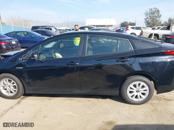 2022 Toyota Prius L Eco with VIN JTDKAMFUXN3163364, listed as a IAAI auction lot 41593914 with 43,948 mi miles. Bid and sale history available at carsss.com. Image 14.