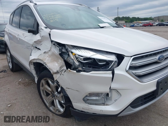 2018 Ford Escape Titanium with VIN 1FMCU0J96JUD36806, listed as a IAAI auction lot 42198506 with 50,710 mi miles and . Bid and sale history available at DreamBid. Image 6.