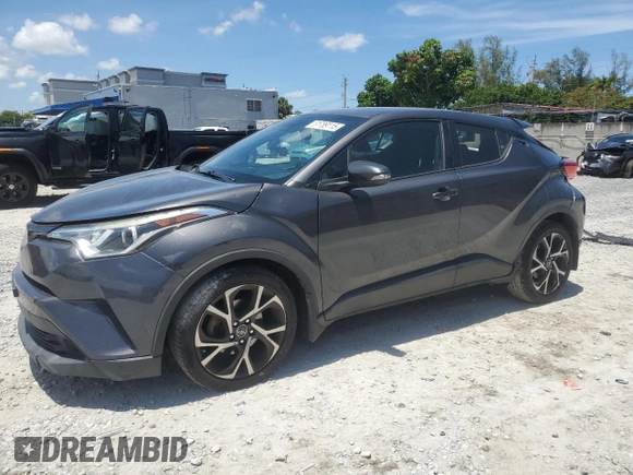 2018 Toyota C-HR XLE with VIN NMTKHMBX4JR042316, listed as a Copart auction lot 61789115 with 67,886 mi miles and Salvage title. Bid and sale history available at DreamBid. Image 1.