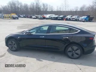 2020 Tesla Model 3 Standard Range Plus with VIN 5YJ3E1EAXLF643807, listed as a IAAI auction lot 41789406 with 49,256 mi miles. Bid and sale history available at carsss.com. Image 13.