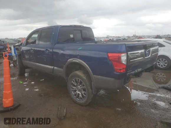2017 Nissan Titan Platinum Reserve z VIN 1N6BA1F40HN569996, wystawiony jako Copart lot #55887505 z przebiegiem 93 488 mil mil oraz Szkoda całkowita • Salvage title. Historia ofert i sprzedaży dostępna na DreamBid. Obrazek 2.