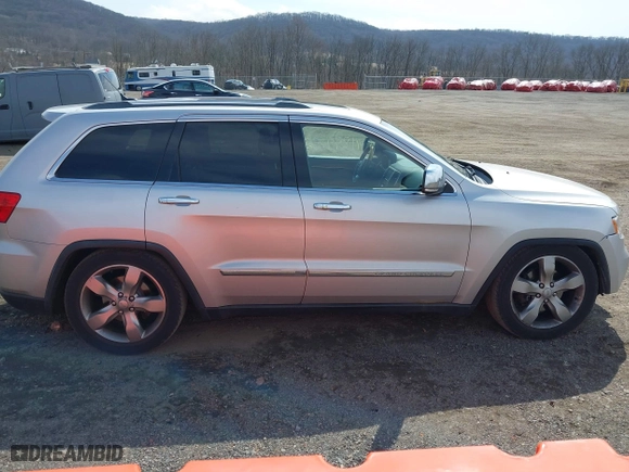 2012 Jeep Grand Cherokee Overland with VIN 1C4RJFCGXCC292257, listed as a IAAI auction lot 41844192 with 182,522 mi miles. Bid and sale history available at carsss.com. Image 13.