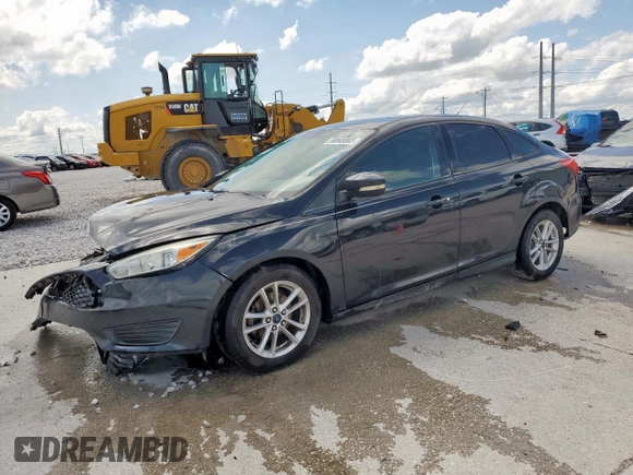 2015 Ford Focus SE with VIN 1FADP3F23FL242768, listed as a Copart auction lot 58068865 with 172,163 mi miles and Salvage title. Bid and sale history available at DreamBid. Image 1.