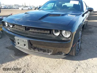 2023 Dodge Challenger SXT with VIN 2C3CDZAG0PH597128, listed as a IAAI auction lot 40865123 with 9,362 mi miles. Bid and sale history available at carsss.com. Image 6.