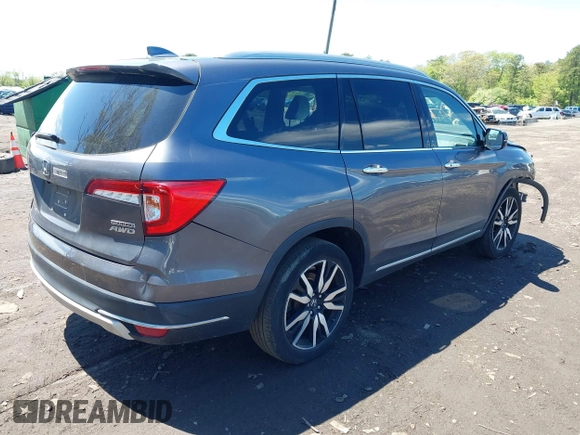 2021 Honda Pilot Touring 8-Passenger z VIN 5FNYF6H9XMB059037, wystawiony jako IAAI lot #42202410 z przebiegiem 49 267 mil mil oraz . Historia ofert i sprzedaży dostępna na DreamBid. Obrazek 4.