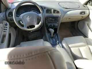 2000 Oldsmobile Alero GLS z VIN 1G3NF52E0YC317362, wystawiony jako Copart lot #48044785 z przebiegiem 169 718 mil mil oraz Szkody całkowita. Historia ofert i sprzedaży dostępna na DreamBid. Obrazek 8.