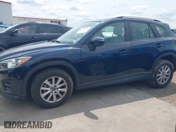 2016 Mazda CX-5 Sport z VIN JM3KE2BY0G0633611, wystawiony jako IAAI lot #42390654 z przebiegiem Nie podano mil oraz . Historia ofert i sprzedaży dostępna na DreamBid. Obrazek 15.