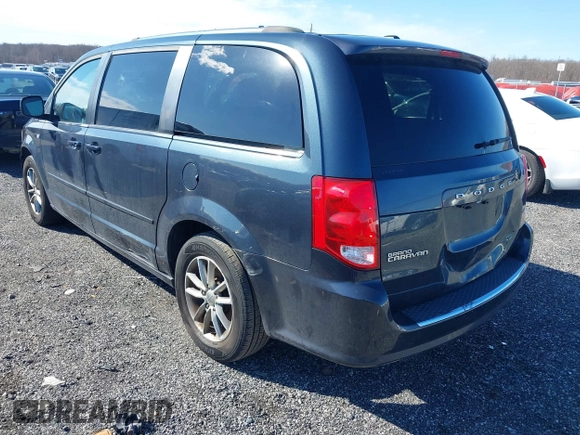 2014 Dodge Grand Caravan SXT with VIN 2C4RDGCG3ER339491, listed as a IAAI auction lot 41744826 with 146,757 mi miles and . Bid and sale history available at DreamBid. Image 3.
