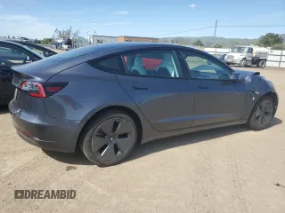 2022 Tesla Model 3 with VIN 5YJ3E1EA4NF244376, listed as a Copart auction lot 52142855 with Not Provided miles and Salvage Title. Bid and sale history available at DreamBid. Image 3.