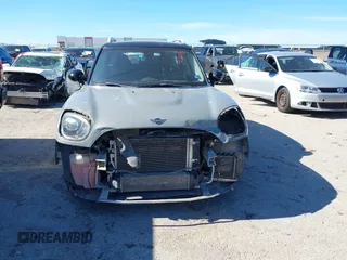 2019 MINI Countryman Cooper S z VIN WMZYT5C54K3G94548, wystawiony jako IAAI lot #42210212 z przebiegiem 82 505 mil mil oraz . Historia ofert i sprzedaży dostępna na DreamBid. Obrazek 12.