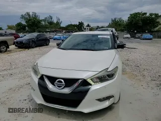 2017 Nissan Maxima SV with VIN 1N4AA6APXHC446995, listed as a Copart auction lot 51633115 with 56,949 mi miles and Salvage Title. Bid and sale history available at DreamBid. Image 10.