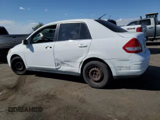 2009 Nissan Versa 1.8 S with VIN 3N1BC11E49L371066, listed as a Copart auction lot 57502474 with 157,127 mi miles and Salvage Title. Bid and sale history available at carsss.com. Image 2.