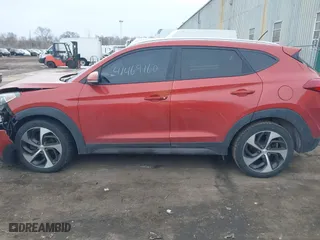 2016 Hyundai Tucson Sport with VIN KM8J33A26GU056164, listed as a IAAI auction lot 41469160 with 136,301 mi miles. Bid and sale history available at carsss.com. Image 14.