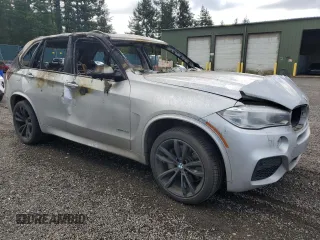 2016 BMW X5 xDrive50i with VIN 5UXKR6C5XG0J82954, listed as a Copart auction lot 51698445 with 0 mi miles and Salvage Title. Bid and sale history available at carsss.com. Image 4.