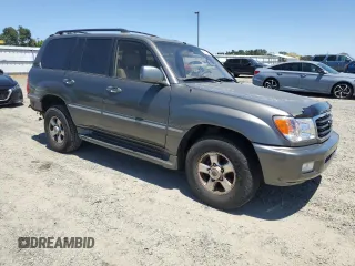 2001 Toyota Land Cruiser z VIN JTEHT05JX12015523, wystawiony jako Copart lot #57561425 z przebiegiem 277 413 mil mil oraz Szkoda całkowita • Salvage title. Historia ofert i sprzedaży dostępna na DreamBid. Obrazek 4.